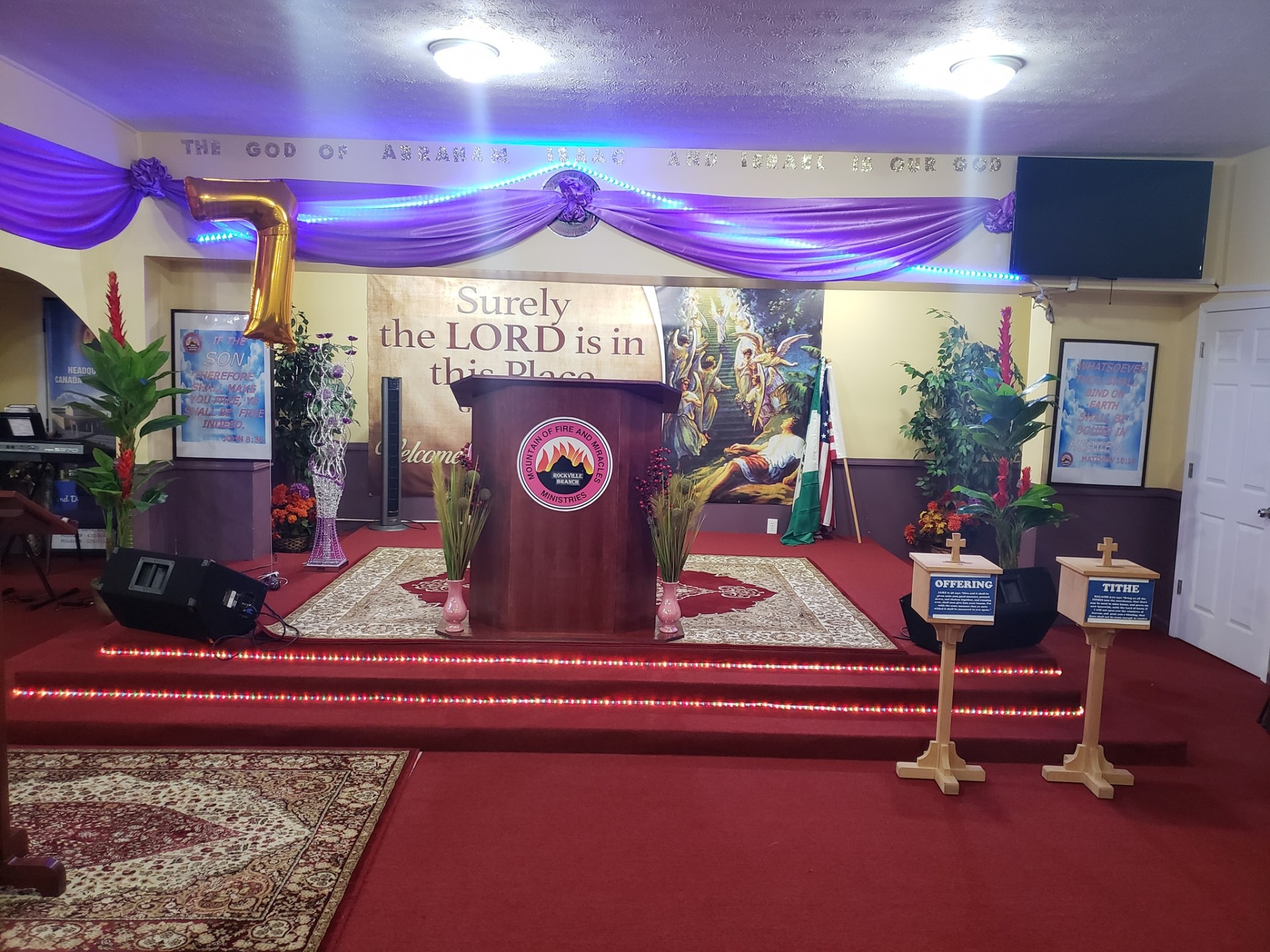 MFM Rockville sanctuary with 'Surely the Lord is in this Place' banner